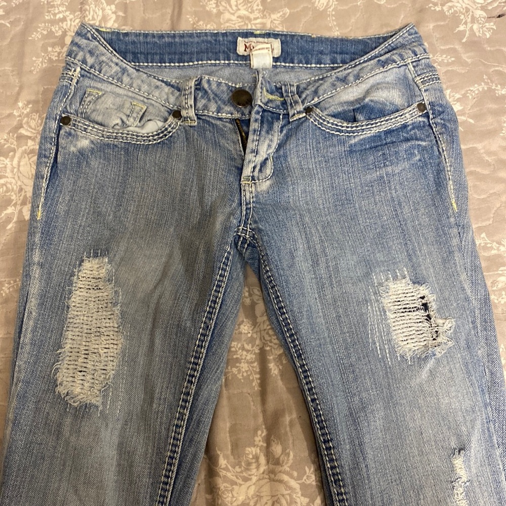 Vintage y2k Ultra low rise Mudd flare jeans in light wash. Size 0